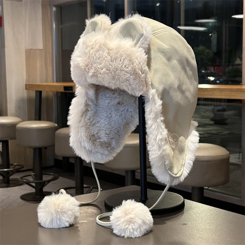 قبعة شتوية دافئة من الجلد الصن - مراجعة Trapper Hat Ear Flap وسعره